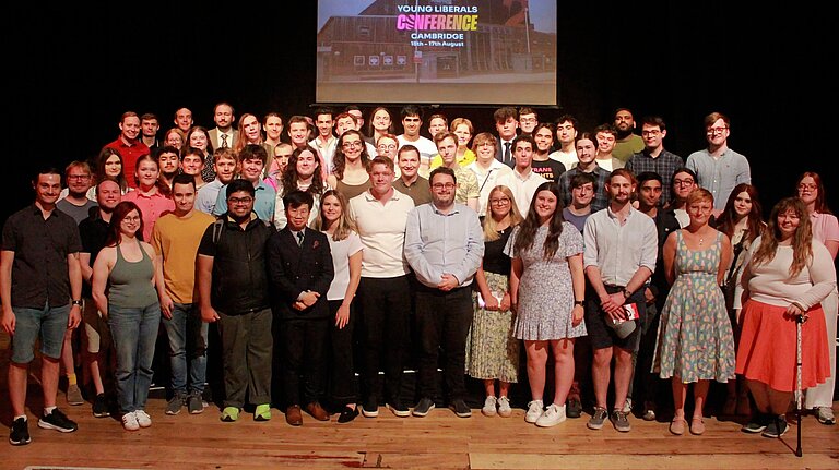 A group of YLers with Carl Cashman Smiling