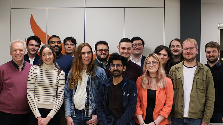 An image of the exec, with the staff member and Honorary President