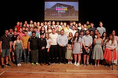 A group of YLers with Carl Cashman Smiling